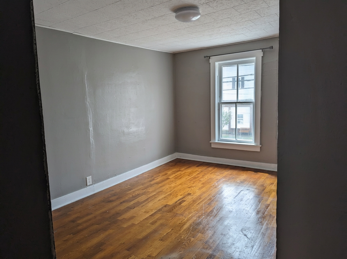 Upstairs bedroom with window